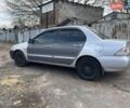 Сірий Міцубісі Lancer, об'ємом двигуна 1.58 л та пробігом 305 тис. км за 3300 $, фото 2 на Automoto.ua