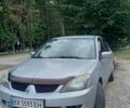 Серый Мицубиси Лансер, объемом двигателя 1.6 л и пробегом 298 тыс. км за 4100 $, фото 13 на Automoto.ua