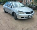 Сірий Міцубісі Lancer, об'ємом двигуна 1.58 л та пробігом 416 тис. км за 3100 $, фото 14 на Automoto.ua