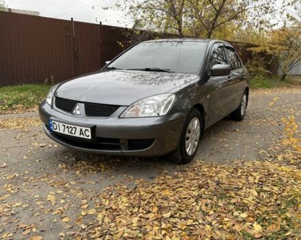 Сірий Міцубісі Lancer, об'ємом двигуна 1.6 л та пробігом 247 тис. км за 4900 $, фото 4 на Automoto.ua