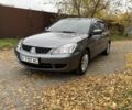 Сірий Міцубісі Lancer, об'ємом двигуна 1.6 л та пробігом 247 тис. км за 4900 $, фото 4 на Automoto.ua