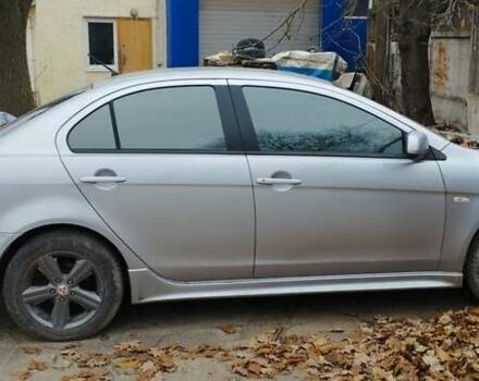 Серый Мицубиси Лансер, объемом двигателя 2 л и пробегом 305 тыс. км за 6300 $, фото 4 на Automoto.ua