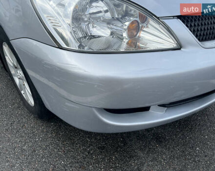 Серый Мицубиси Лансер, объемом двигателя 1.58 л и пробегом 232 тыс. км за 4900 $, фото 4 на Automoto.ua