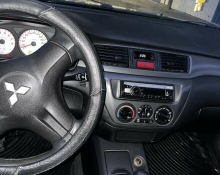 Сірий Міцубісі Lancer, об'ємом двигуна 1.6 л та пробігом 330 тис. км за 3500 $, фото 31 на Automoto.ua