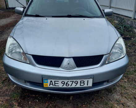 Сірий Міцубісі Lancer, об'ємом двигуна 1.58 л та пробігом 220 тис. км за 5000 $, фото 3 на Automoto.ua