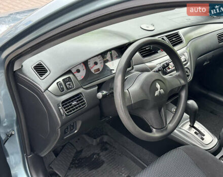 Сірий Міцубісі Lancer, об'ємом двигуна 1.6 л та пробігом 116 тис. км за 5199 $, фото 15 на Automoto.ua