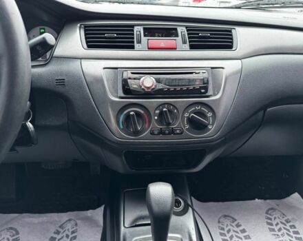 Серый Мицубиси Лансер, объемом двигателя 1.6 л и пробегом 205 тыс. км за 5300 $, фото 8 на Automoto.ua