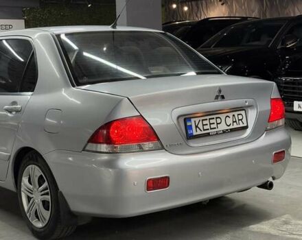 Серый Мицубиси Лансер, объемом двигателя 1.58 л и пробегом 271 тыс. км за 4200 $, фото 16 на Automoto.ua