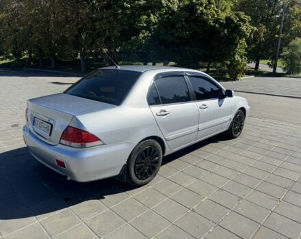 Серый Мицубиси Лансер, объемом двигателя 1.6 л и пробегом 265 тыс. км за 4100 $, фото 3 на Automoto.ua