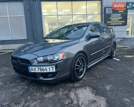 Серый Мицубиси Лансер, объемом двигателя 2 л и пробегом 170 тыс. км за 6999 $, фото 1 на Automoto.ua