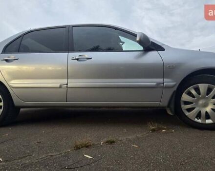 Сірий Міцубісі Lancer, об'ємом двигуна 1.6 л та пробігом 213 тис. км за 3600 $, фото 42 на Automoto.ua