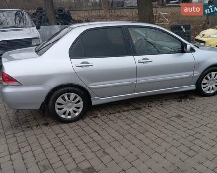 Серый Мицубиси Лансер, объемом двигателя 1.6 л и пробегом 175 тыс. км за 4200 $, фото 8 на Automoto.ua