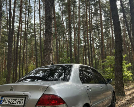 Серый Мицубиси Лансер, объемом двигателя 1.6 л и пробегом 248 тыс. км за 3000 $, фото 6 на Automoto.ua