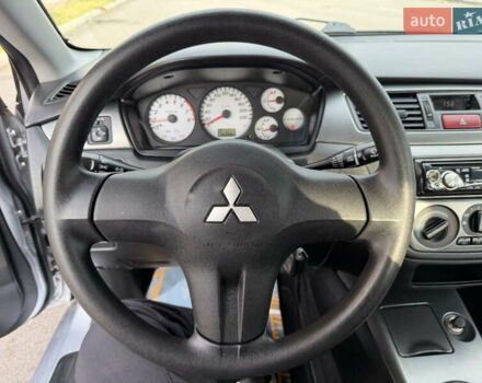 Серый Мицубиси Лансер, объемом двигателя 1.3 л и пробегом 160 тыс. км за 5555 $, фото 48 на Automoto.ua