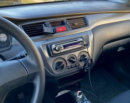 Сірий Міцубісі Lancer, об'ємом двигуна 1.6 л та пробігом 240 тис. км за 4450 $, фото 8 на Automoto.ua