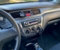 Сірий Міцубісі Lancer, об'ємом двигуна 1.6 л та пробігом 240 тис. км за 4450 $, фото 8 на Automoto.ua