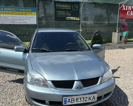 Сірий Міцубісі Lancer, об'ємом двигуна 1.58 л та пробігом 180 тис. км за 4400 $, фото 5 на Automoto.ua