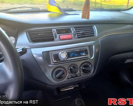 Сірий Міцубісі Lancer, об'ємом двигуна 1.6 л та пробігом 225 тис. км за 3200 $, фото 4 на Automoto.ua