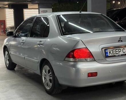 Серый Мицубиси Лансер, объемом двигателя 1.58 л и пробегом 271 тыс. км за 4200 $, фото 14 на Automoto.ua