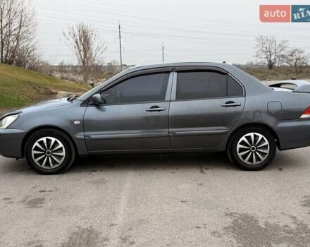 Сірий Міцубісі Lancer, об'ємом двигуна 1.6 л та пробігом 270 тис. км за 4300 $, фото 2 на Automoto.ua