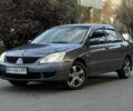Серый Мицубиси Лансер, объемом двигателя 1.6 л и пробегом 220 тыс. км за 3199 $, фото 1 на Automoto.ua