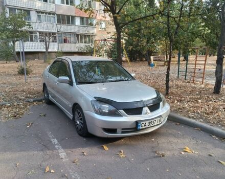 Сірий Міцубісі Lancer, об'ємом двигуна 2 л та пробігом 275 тис. км за 4250 $, фото 2 на Automoto.ua