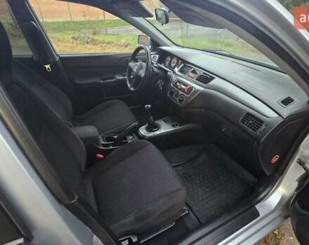 Сірий Міцубісі Lancer, об'ємом двигуна 1.6 л та пробігом 213 тис. км за 3600 $, фото 40 на Automoto.ua