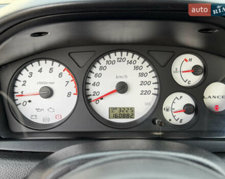 Серый Мицубиси Лансер, объемом двигателя 1.3 л и пробегом 160 тыс. км за 5555 $, фото 49 на Automoto.ua