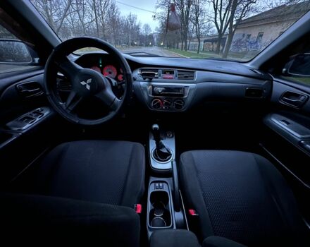 Сірий Міцубісі Lancer, об'ємом двигуна 1.6 л та пробігом 210 тис. км за 4750 $, фото 9 на Automoto.ua