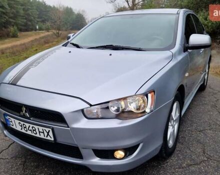 Серый Мицубиси Лансер, объемом двигателя 2 л и пробегом 213 тыс. км за 6550 $, фото 4 на Automoto.ua
