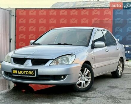 Сірий Міцубісі Lancer, об'ємом двигуна 1.6 л та пробігом 395 тис. км за 4900 $, фото 1 на Automoto.ua