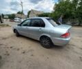 Сірий Міцубісі Lancer, об'ємом двигуна 1.58 л та пробігом 416 тис. км за 3100 $, фото 13 на Automoto.ua