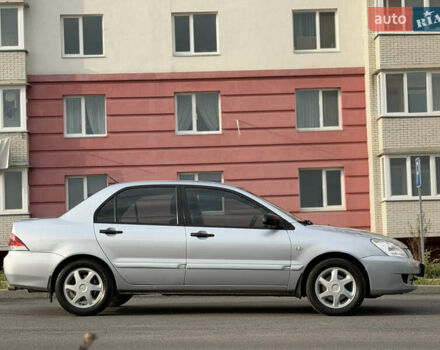 Серый Мицубиси Лансер, объемом двигателя 1.3 л и пробегом 160 тыс. км за 5555 $, фото 13 на Automoto.ua