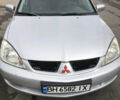 Сірий Міцубісі Lancer, об'ємом двигуна 1.6 л та пробігом 450 тис. км за 4200 $, фото 1 на Automoto.ua