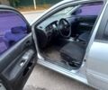 Серый Мицубиси Лансер, объемом двигателя 1.6 л и пробегом 235 тыс. км за 2550 $, фото 5 на Automoto.ua