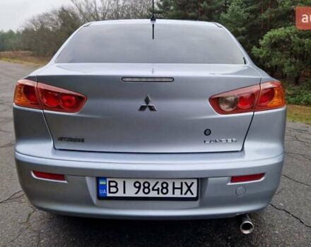 Серый Мицубиси Лансер, объемом двигателя 2 л и пробегом 213 тыс. км за 6550 $, фото 8 на Automoto.ua