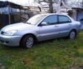 Сірий Міцубісі Lancer, об'ємом двигуна 1 л та пробігом 400 тис. км за 2850 $, фото 2 на Automoto.ua