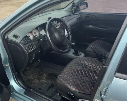 Сірий Міцубісі Lancer, об'ємом двигуна 1.58 л та пробігом 341 тис. км за 4500 $, фото 1 на Automoto.ua
