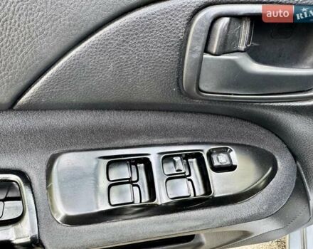 Сірий Міцубісі Lancer, об'ємом двигуна 1.58 л та пробігом 138 тис. км за 4990 $, фото 24 на Automoto.ua