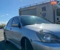 Серый Мицубиси Лансер, объемом двигателя 2 л и пробегом 320 тыс. км за 4300 $, фото 3 на Automoto.ua