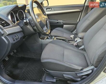 Серый Мицубиси Лансер, объемом двигателя 2 л и пробегом 282 тыс. км за 5450 $, фото 45 на Automoto.ua