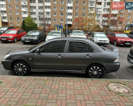 Серый Мицубиси Лансер, объемом двигателя 1.6 л и пробегом 115 тыс. км за 2800 $, фото 2 на Automoto.ua