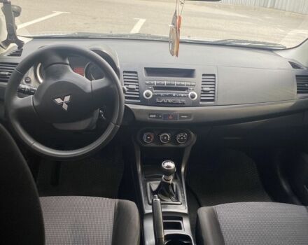 Серый Мицубиси Лансер, объемом двигателя 1.5 л и пробегом 188 тыс. км за 4999 $, фото 5 на Automoto.ua