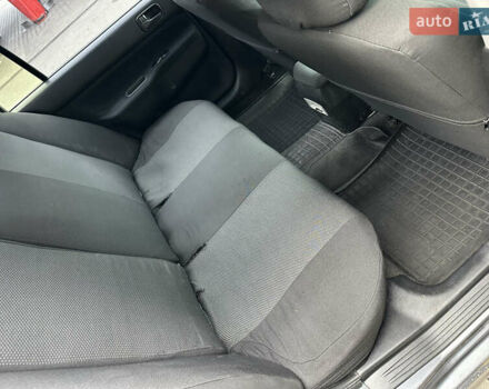 Сірий Міцубісі Lancer, об'ємом двигуна 1.6 л та пробігом 115 тис. км за 2800 $, фото 18 на Automoto.ua