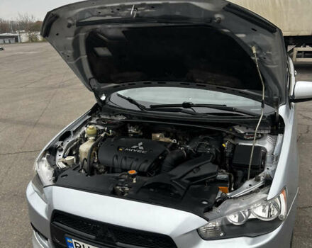 Серый Мицубиси Лансер, объемом двигателя 2 л и пробегом 286 тыс. км за 5800 $, фото 8 на Automoto.ua