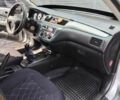 Серый Мицубиси Лансер, объемом двигателя 1.6 л и пробегом 290 тыс. км за 4600 $, фото 1 на Automoto.ua