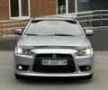 Сірий Міцубісі Lancer, об'ємом двигуна 2 л та пробігом 220 тис. км за 6400 $, фото 4 на Automoto.ua