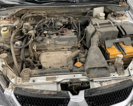 Серый Мицубиси Лансер, объемом двигателя 1.6 л и пробегом 263 тыс. км за 2350 $, фото 13 на Automoto.ua