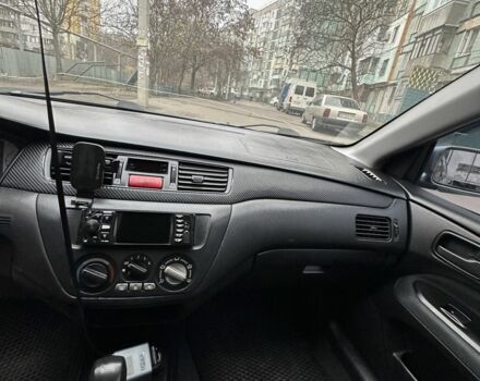 Серый Мицубиси Лансер, объемом двигателя 1.6 л и пробегом 238 тыс. км за 4300 $, фото 8 на Automoto.ua