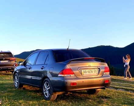Сірий Міцубісі Lancer, об'ємом двигуна 1.6 л та пробігом 240 тис. км за 4450 $, фото 3 на Automoto.ua